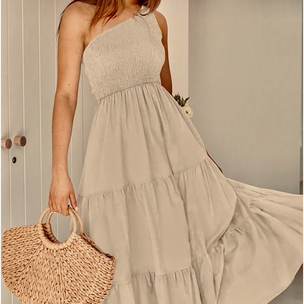 This fresh and sexy one strap sundress is made of lightweight rayon fabric.